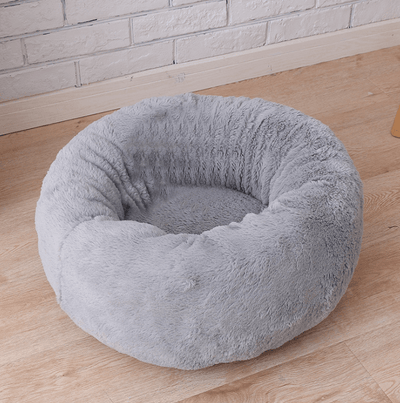 grey dog bed with blanket