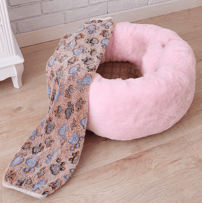pink dog bed with blanket