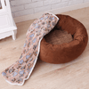 brown dog bed with blanket